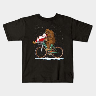 Bigfoot and Santa riding a bike Kids T-Shirt